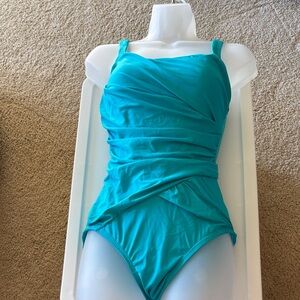SPANX Swim One Piece in Aqua Blue. Brand new. Never worn.